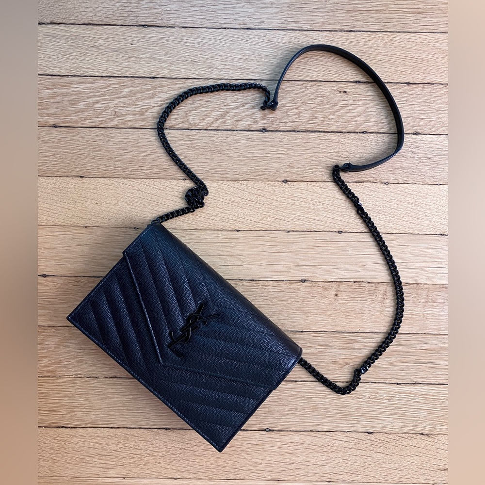 Saint Laurent Monogram Envelope Clutch Bag in black leather and black hardware.